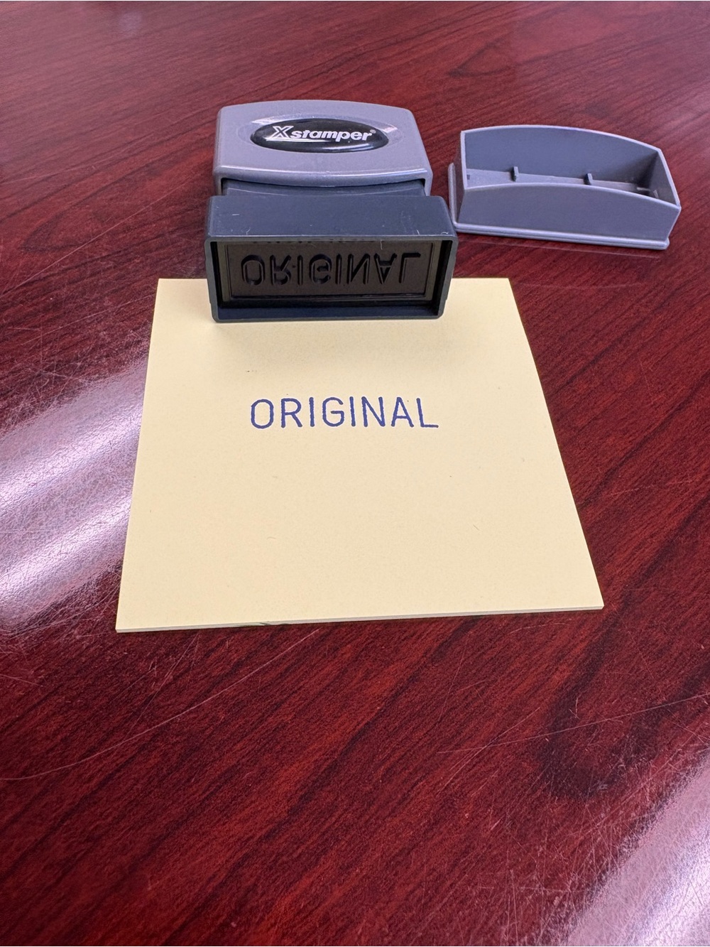 Xstamper Self-Inking Stamp in Gray with Blue Impression